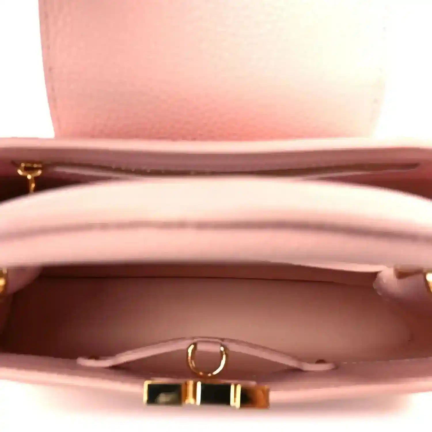 Louis Vuitton Capucines BB shoulder bag open interior view with gold clasp hardware
