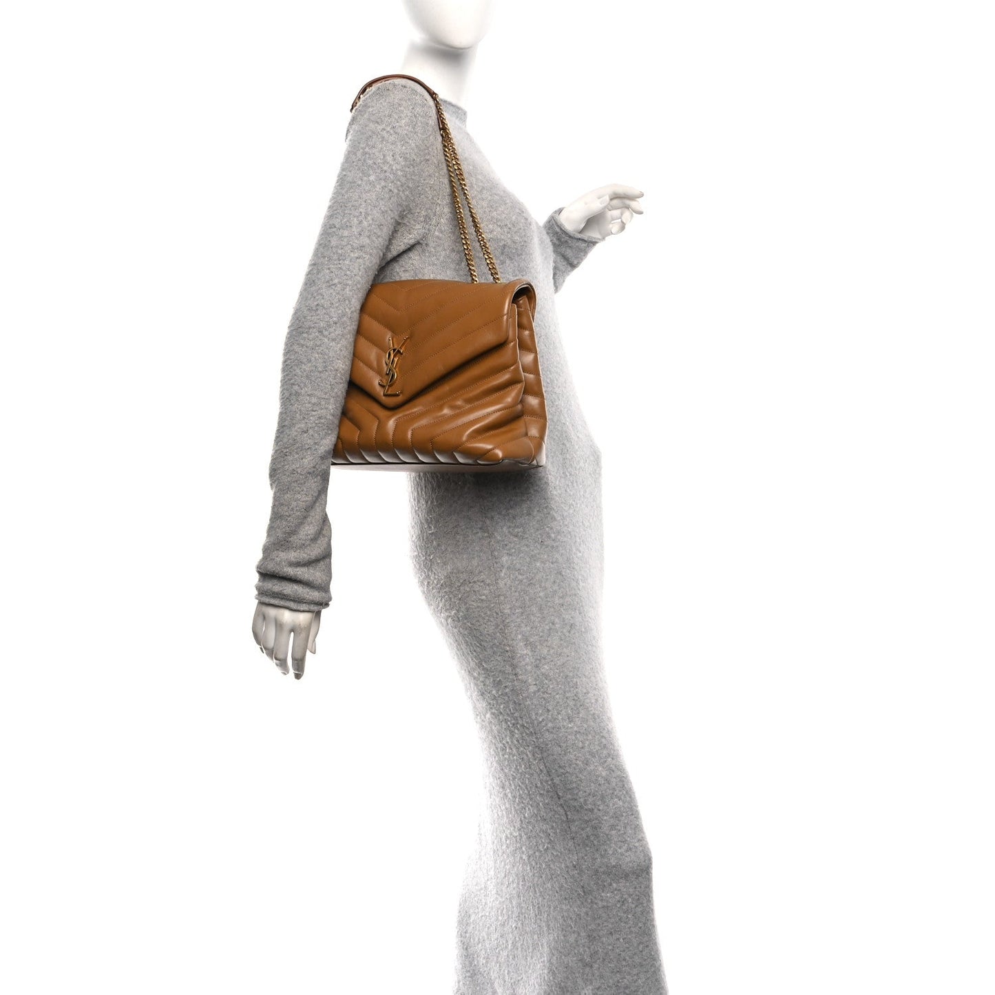 Tan leather medium satchel with chain strap, worn on a mannequin with gray outfit