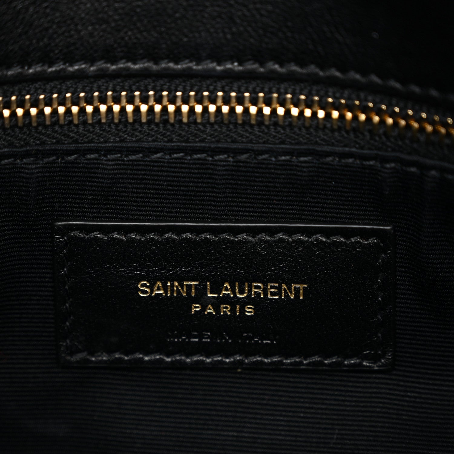 Saint Laurent Paris leather label on interior lining with gold-tone zipper
