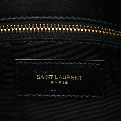 Saint Laurent Paris leather label on interior lining with gold-tone zipper