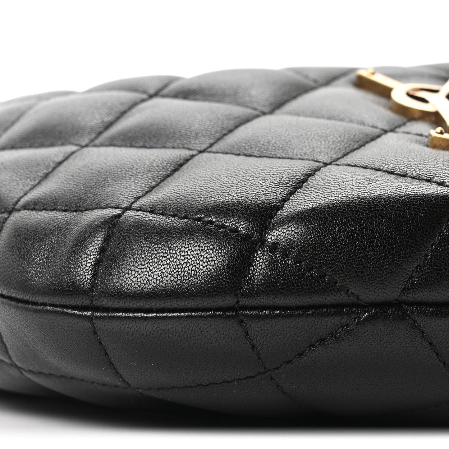 Quilted black leather bag with stitched diamond pattern