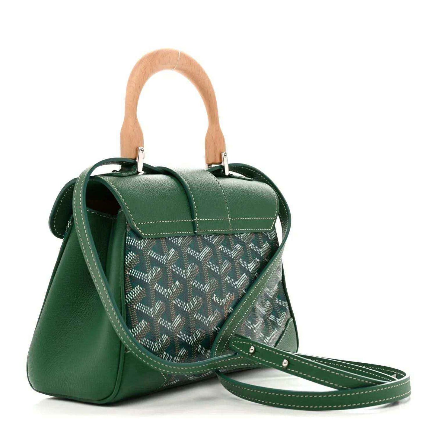 Green mini Saigon bag with tan top handle, front flap, and long crossbody strap