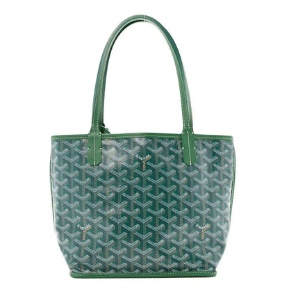 Green patterned mini tote bag with double handles and stitched trim