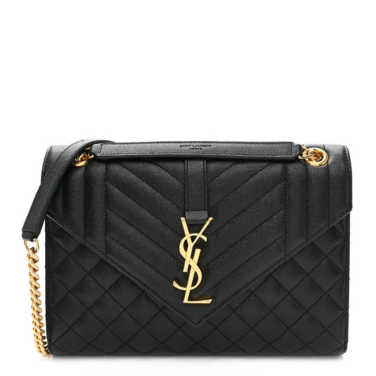 Black quilted satchel bag with front flap, gold YSL monogram, and shoulder chain