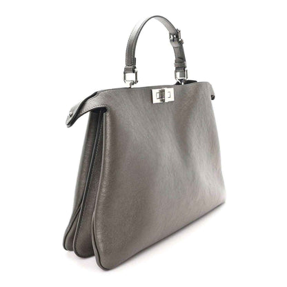 Fendi Peekaboo leather tote in tortora, side view with top handles and turn-lock clasp