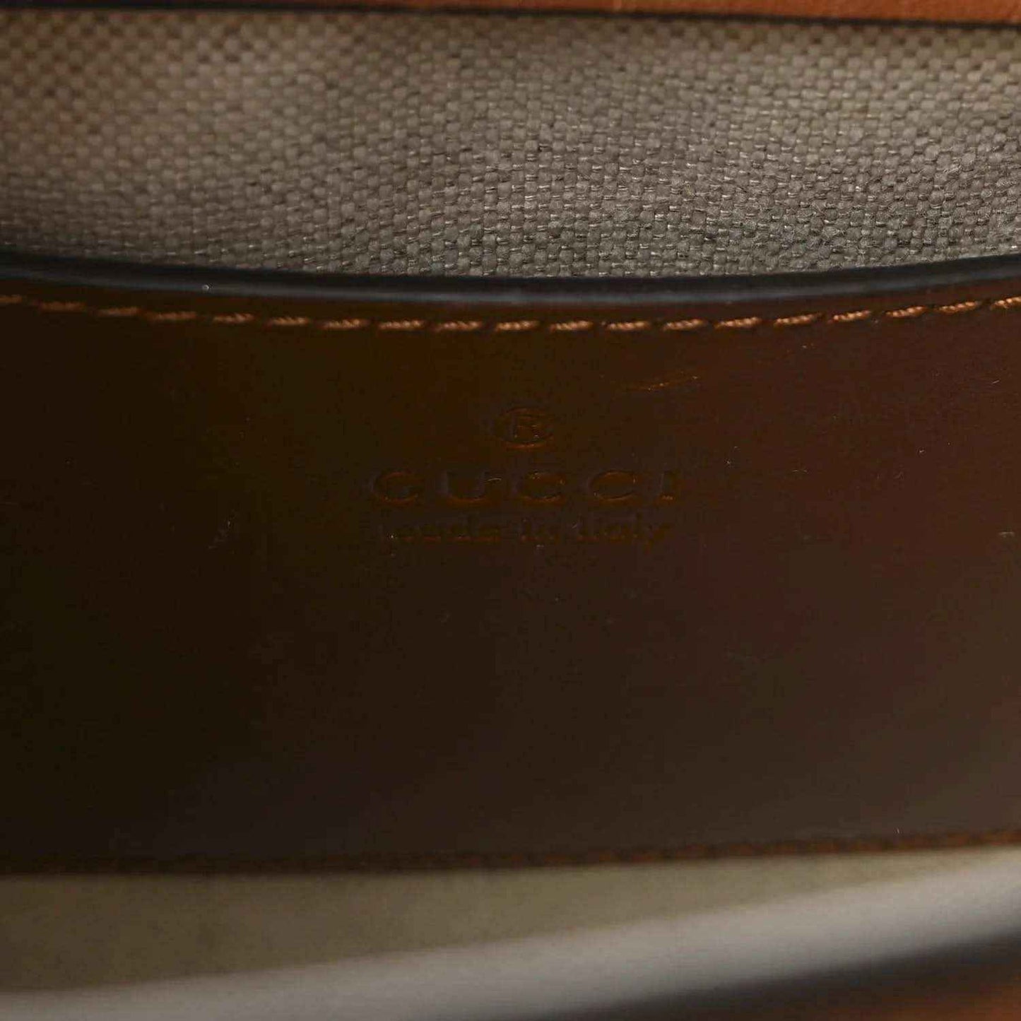 Gucci mini tote bag interior, brown leather with embossed logo stamp