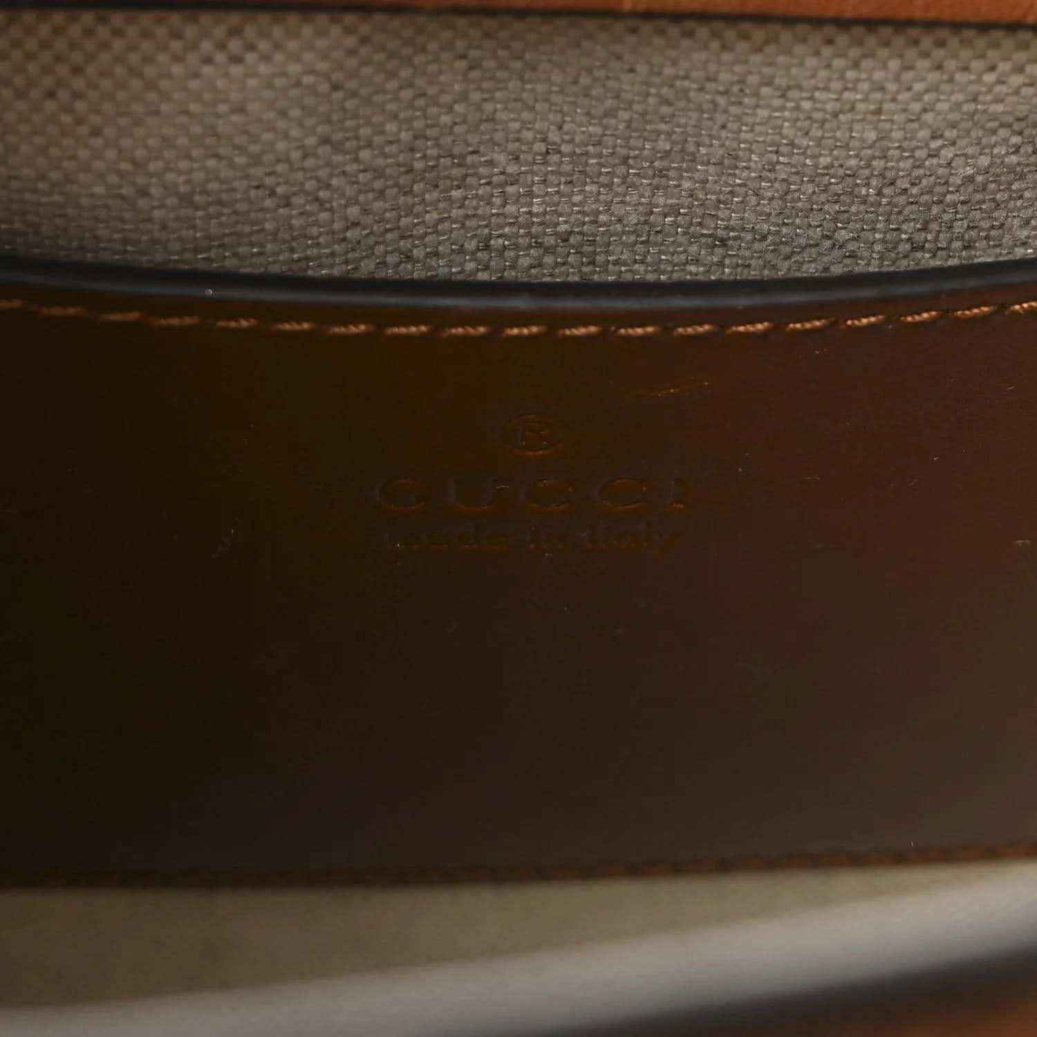 Gucci mini tote bag interior, brown leather with embossed logo stamp