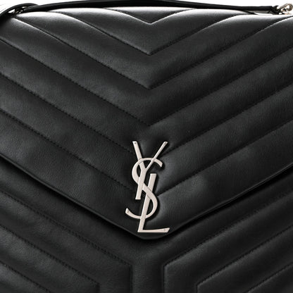 YSL monogram on black quilted leather satchel