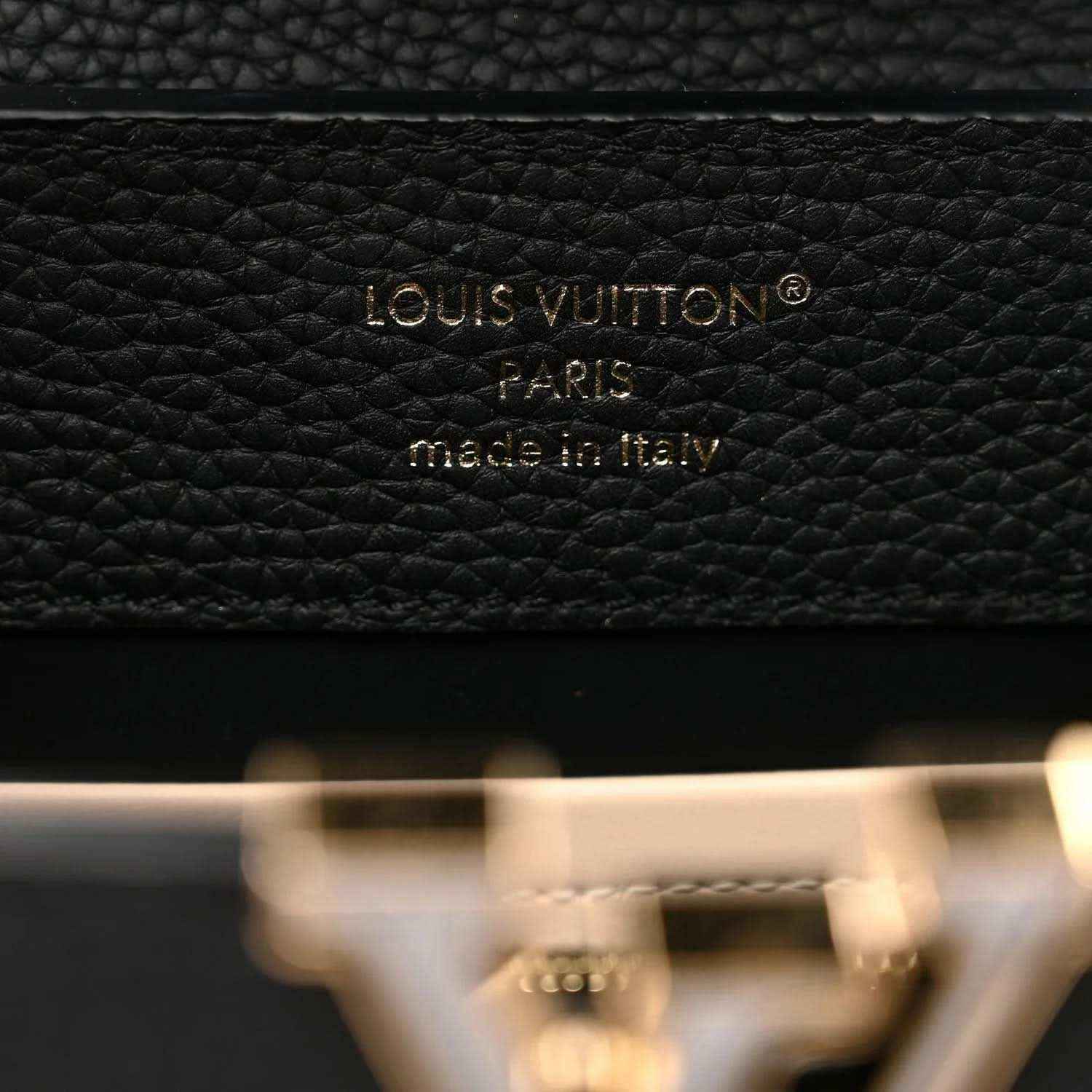 Black leather handbag with Louis Vuitton Paris made in Italy stamp