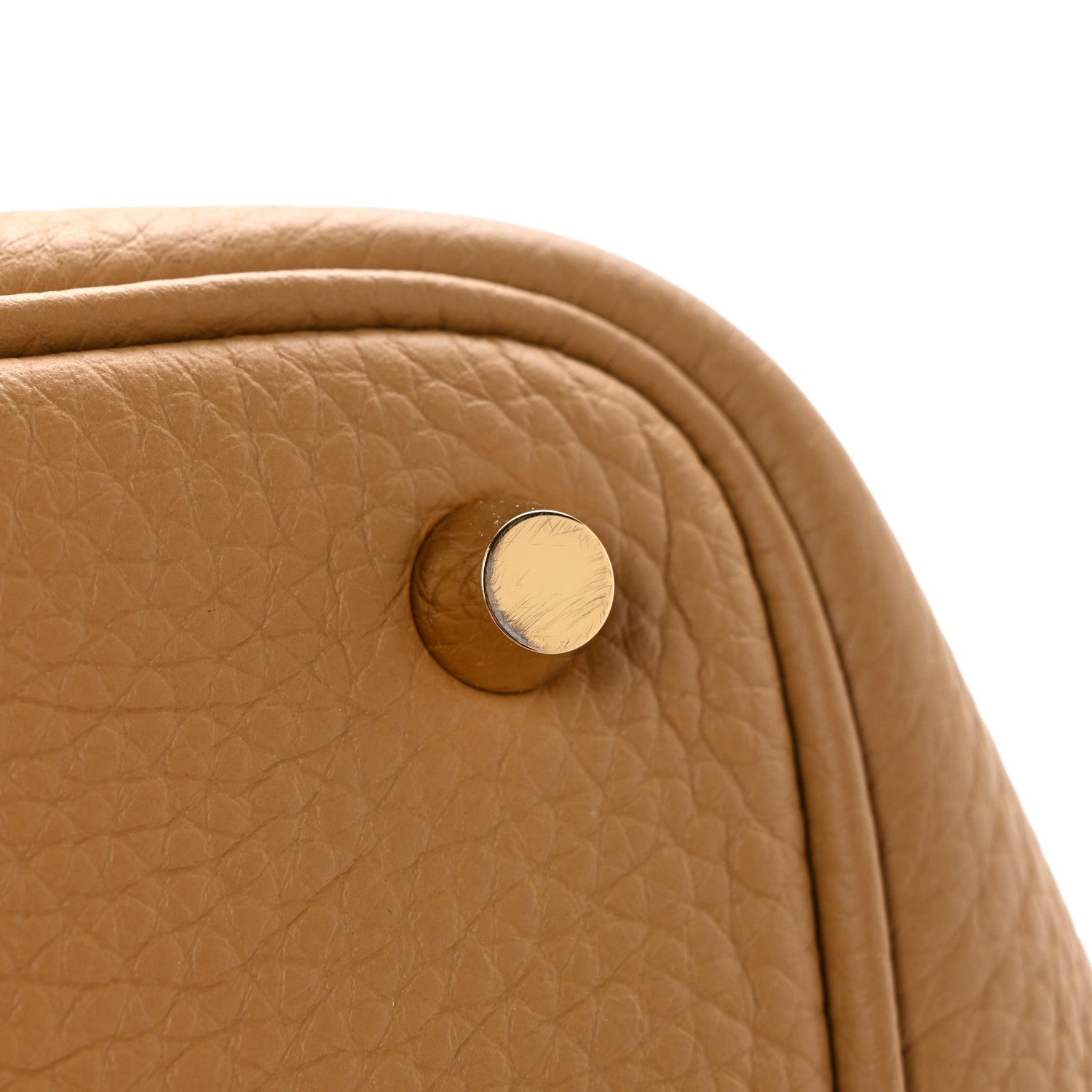 Biscuit tan textured leather bucket bag with round lock hardware