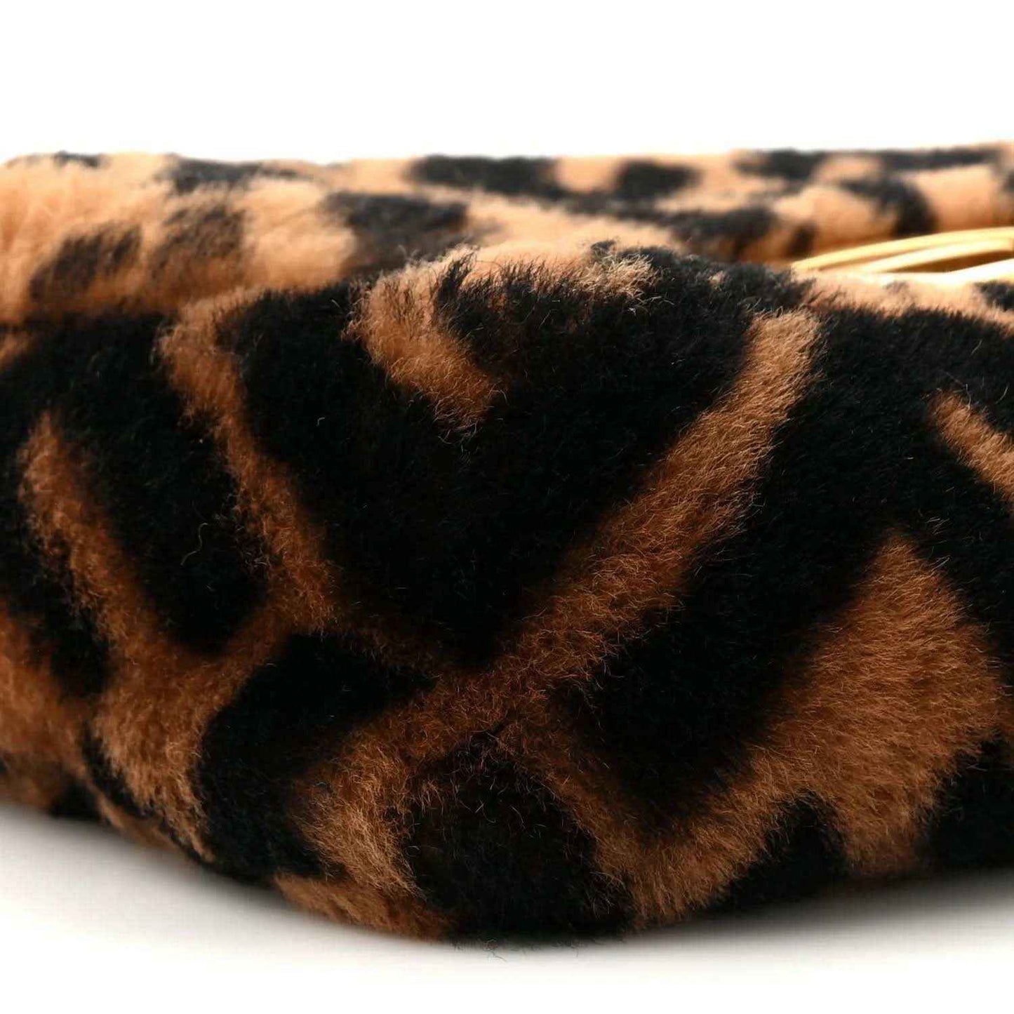 Shearling FF logo pattern on mini baguette bag, tobacco brown and dark black close-up.