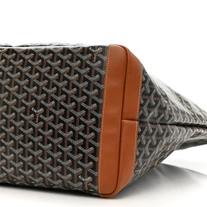 Goyard Artois GM tote bag corner close-up, black Goyardine canvas with tan leather edging