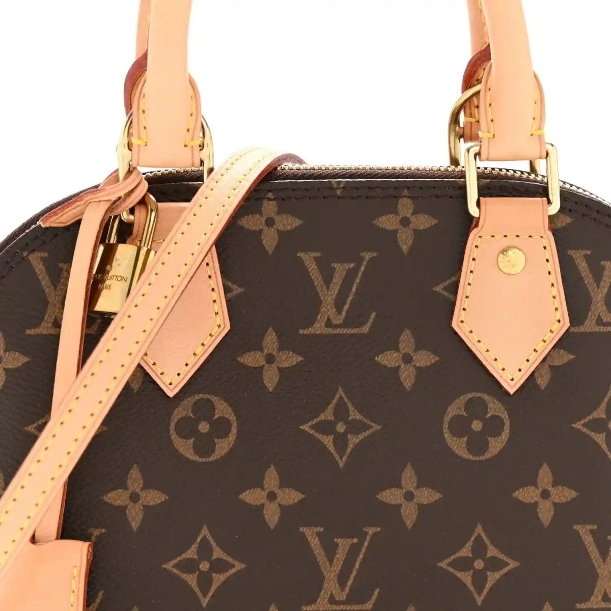 Monogram tote bag front view with tan leather strap ties, handles, and gold clasp