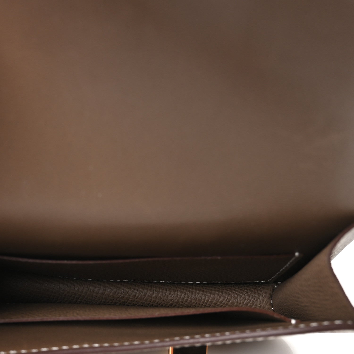 Hermes Constance slim wallet interior, dark lining and stitched seams