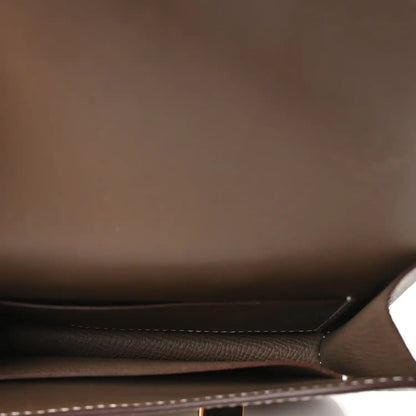 Hermes Constance slim wallet interior, dark lining and stitched seams