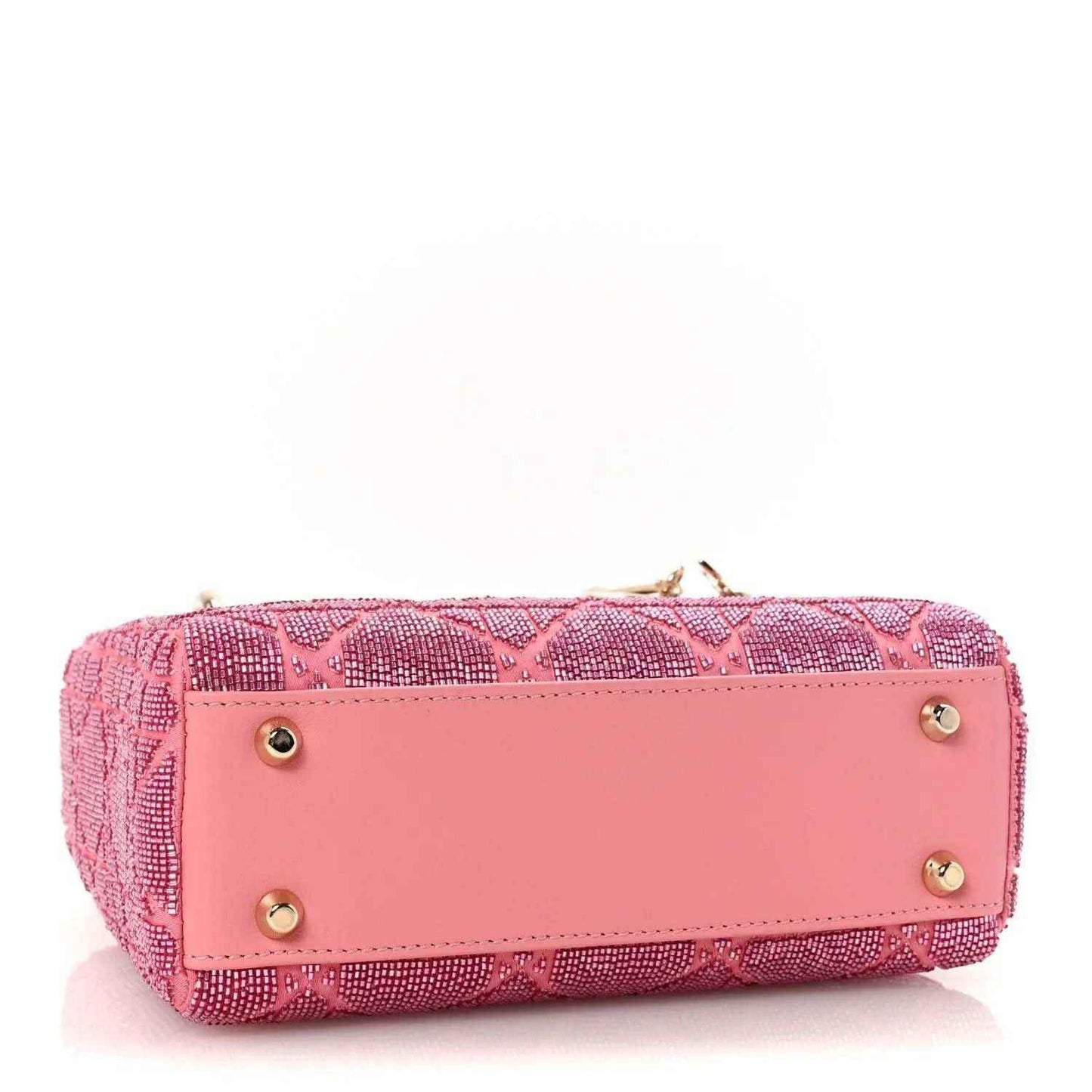 Mini Lady Dior handbag in light pink with front flap and gold button hardware