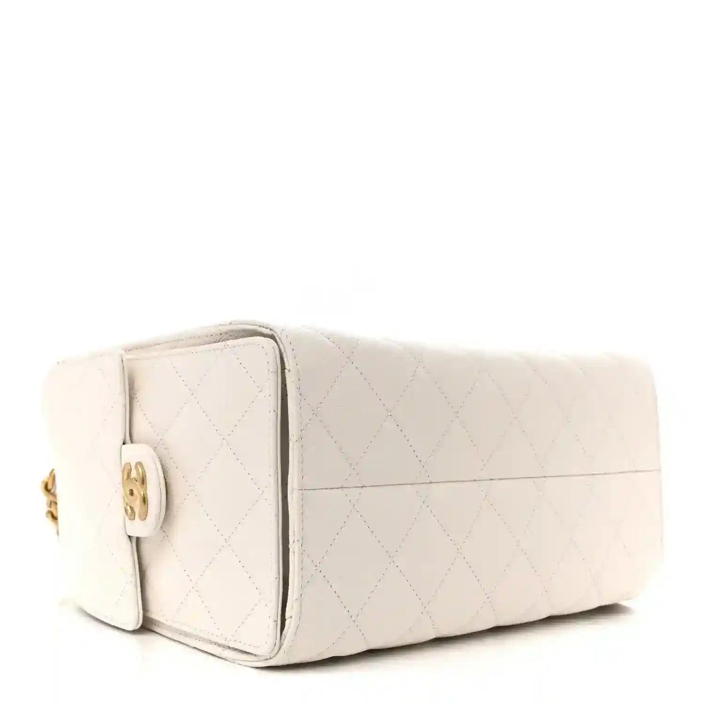White quilted caviar leather mini handbag with turn-lock clasp, angled view