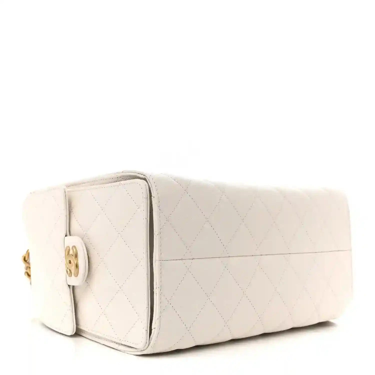 White quilted caviar leather mini handbag with turn-lock clasp, angled view