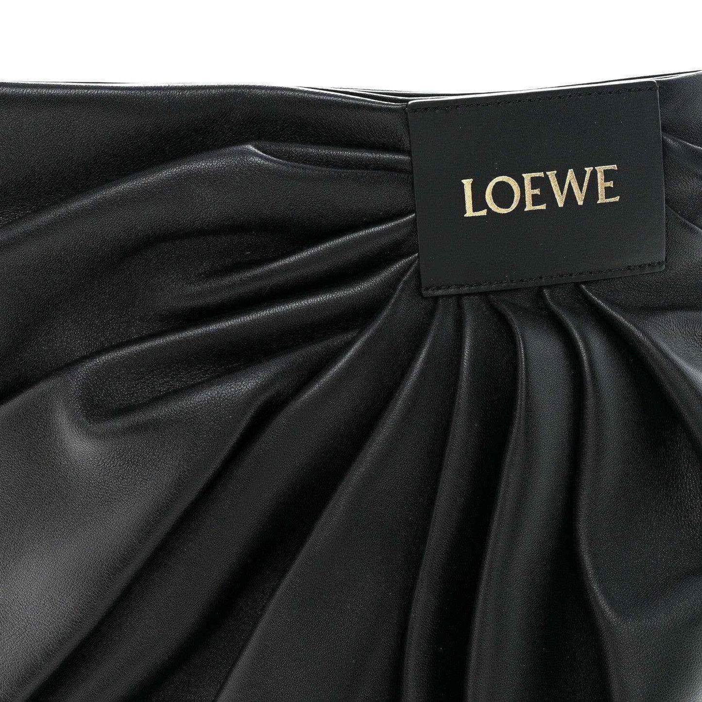Black leather draped front with LOEWE label at gathered opening