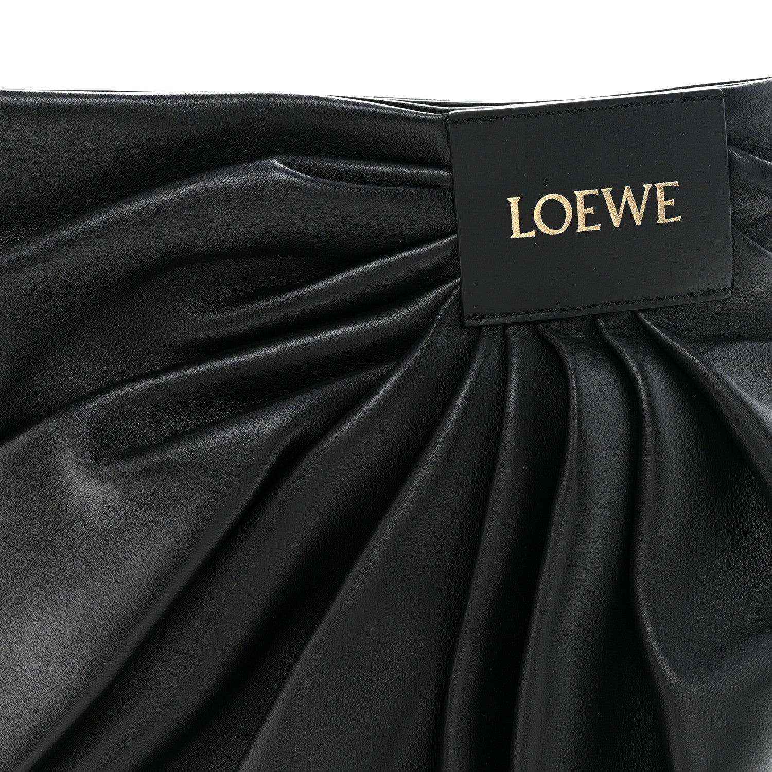 Black leather draped front with LOEWE label at gathered opening