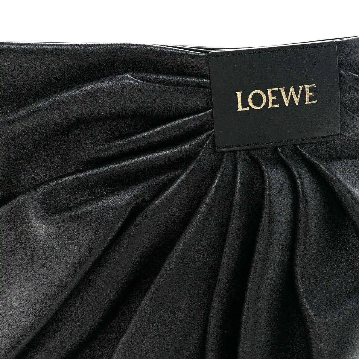 Black leather draped front with LOEWE label at gathered opening
