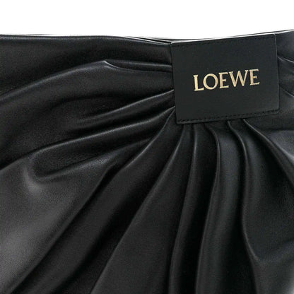 Black leather draped front with LOEWE label at gathered opening