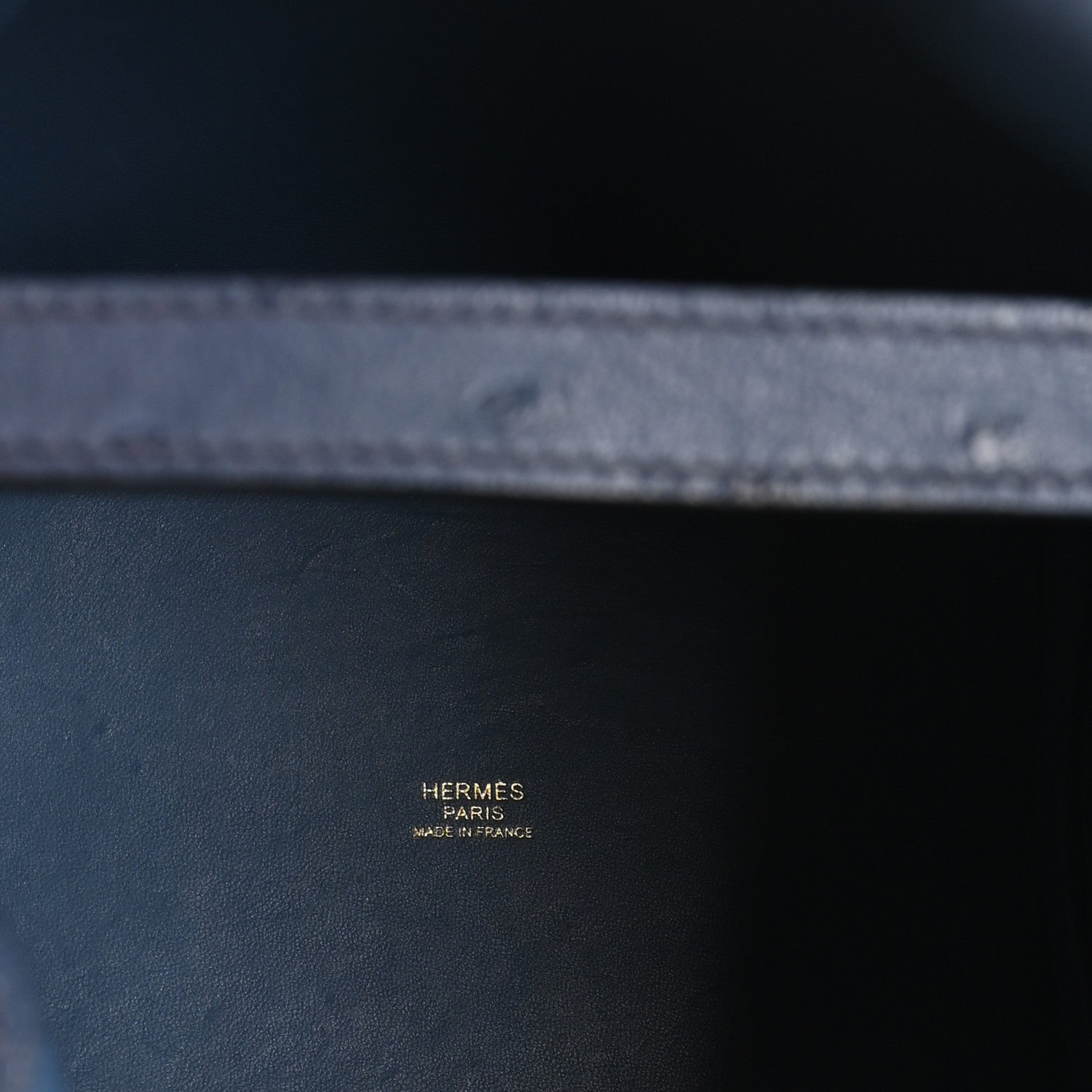 Blue leather interior with stamp reading HERMES PARIS MADE IN FRANCE.