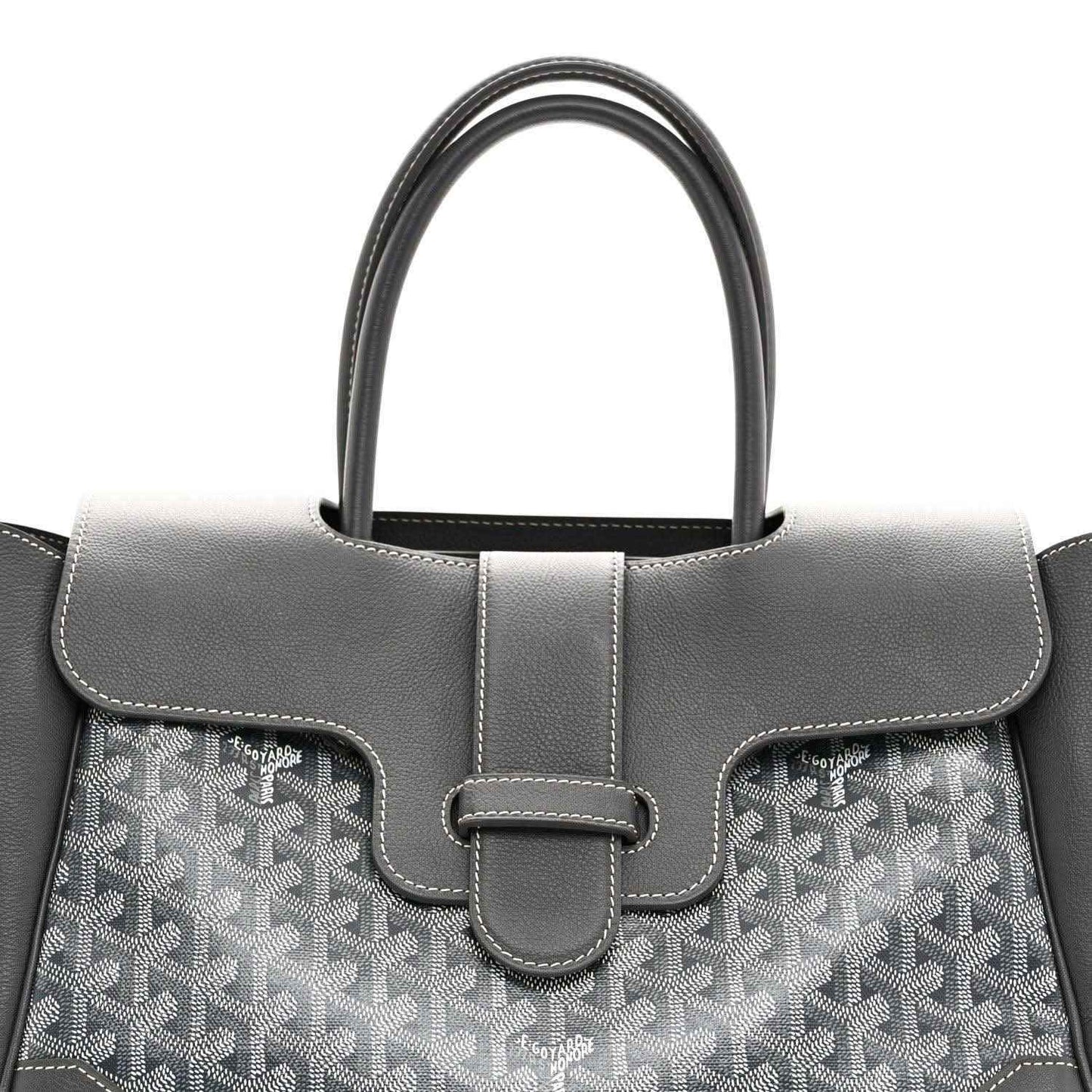 Grey Goyard tote front with leather handle, buckled strap detail and patterned canvas