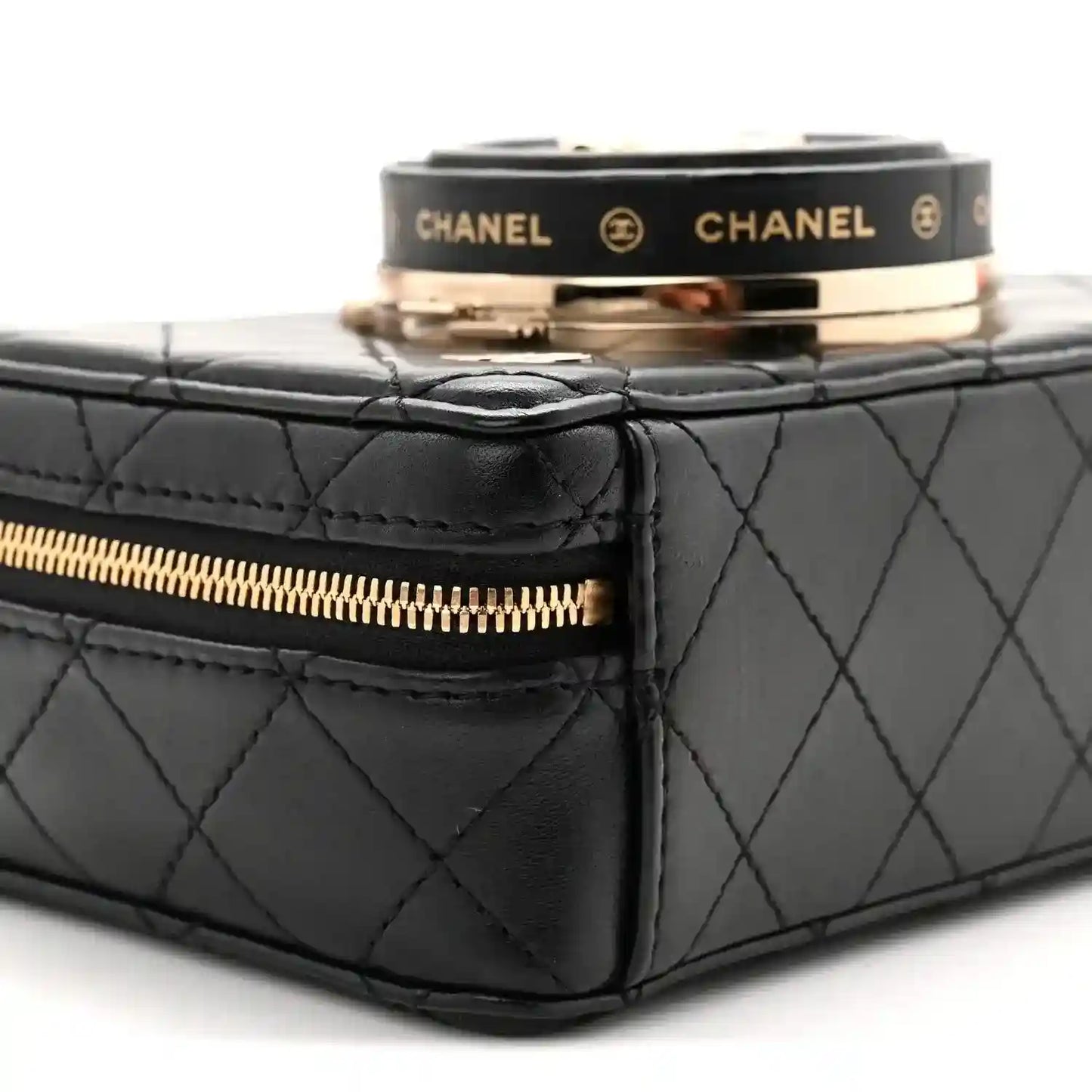 Black quilted lambskin bag with gold-tone zipper and side panel stitching