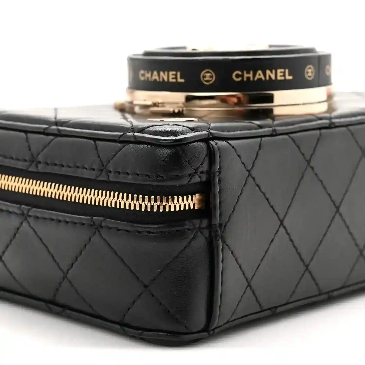 Black quilted lambskin bag with gold-tone zipper and side panel stitching