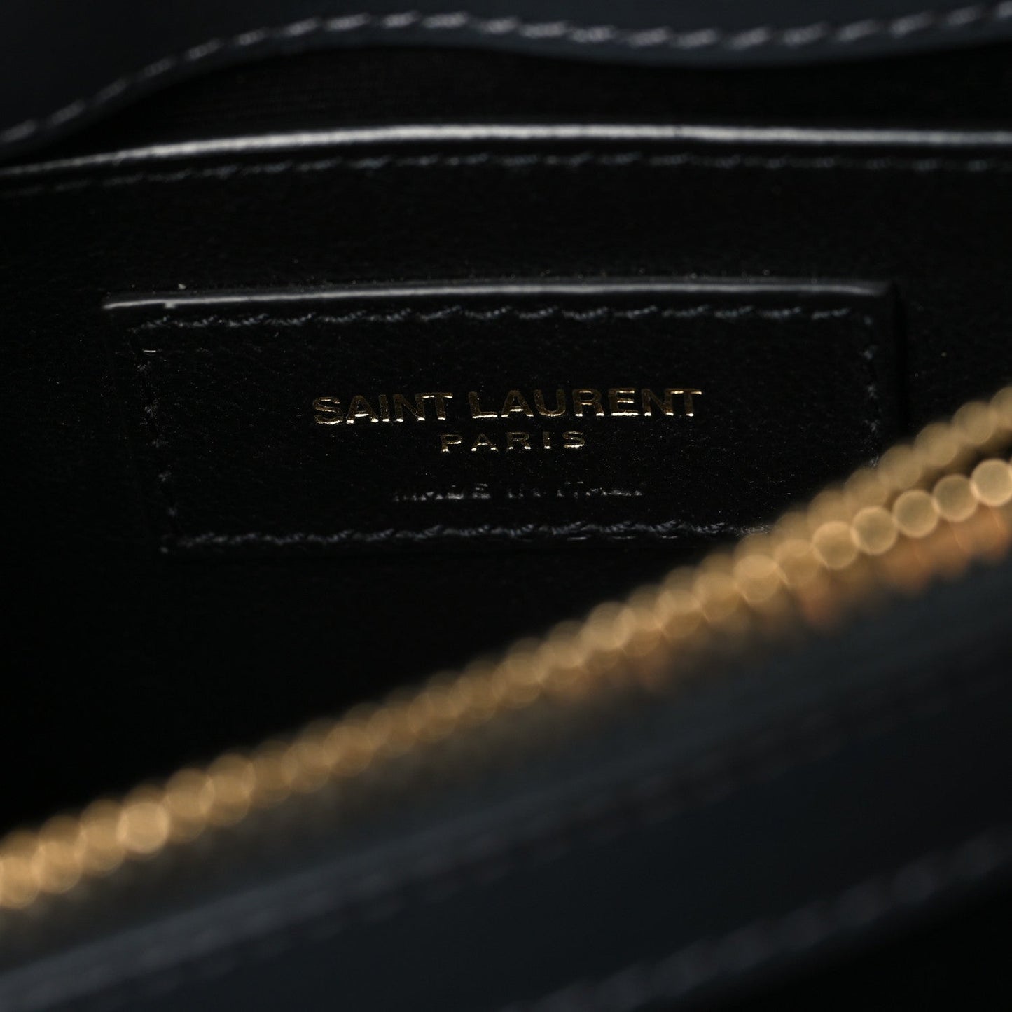 Saint Laurent leather satchel interior label with gold chain strap, dark blue