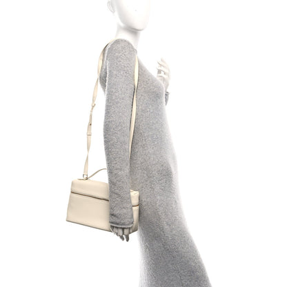 Loro Piana grained calfskin extra pocket pouch in whisper white worn crossbody with strap