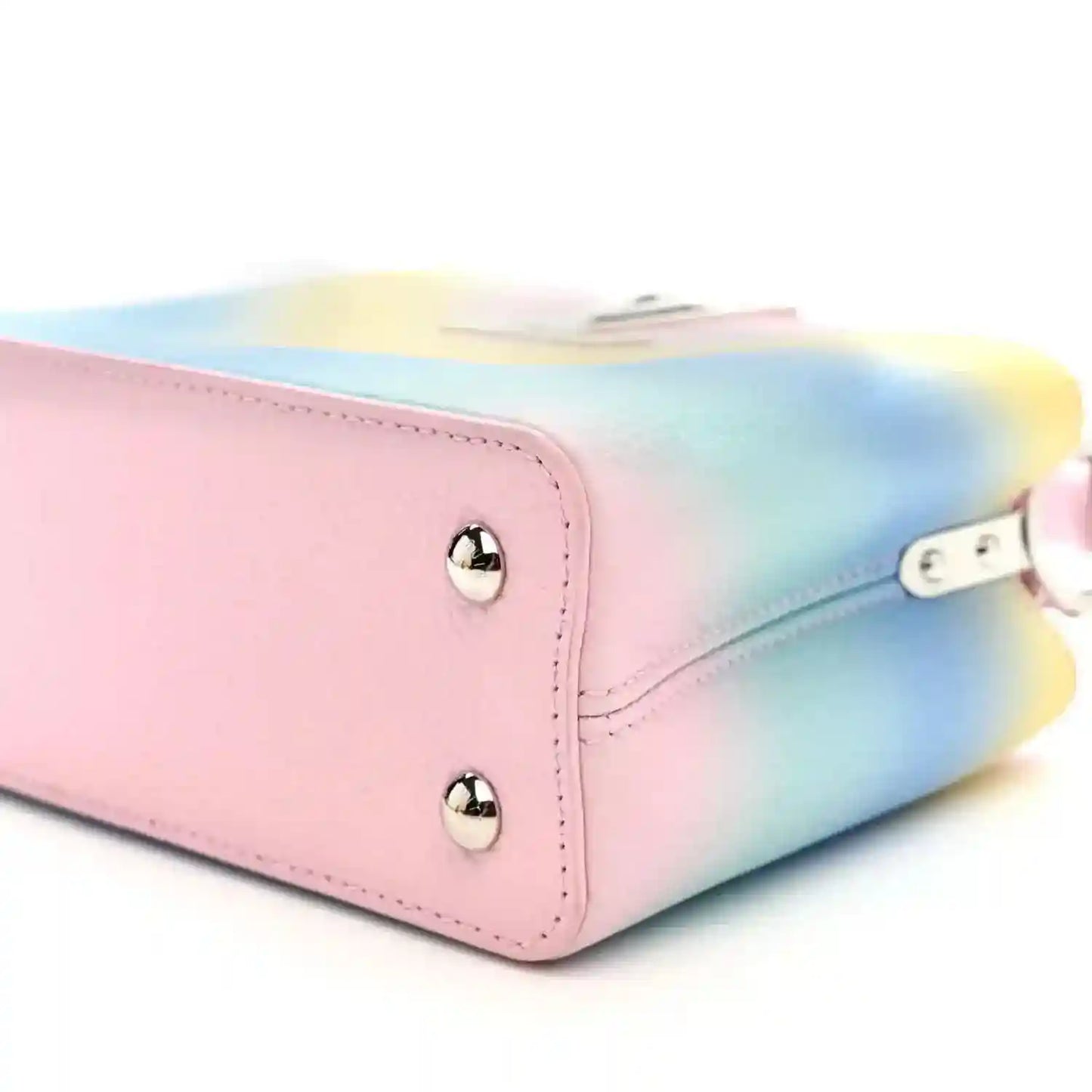 Mini Capucines bag end with silver studs, pastel pink and blue gradient leather