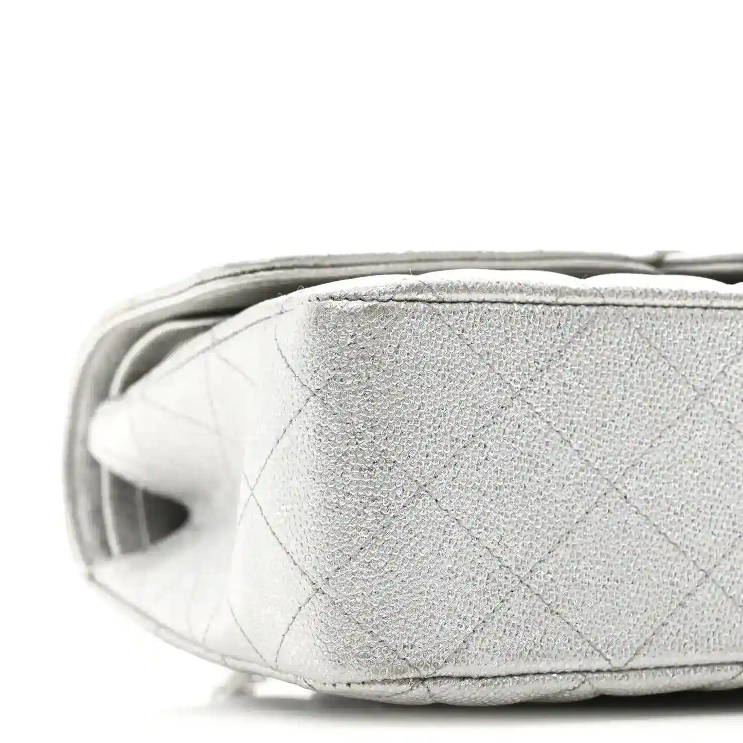 Chanel silver metallic double flap bag side panel close-up with quilted texture
