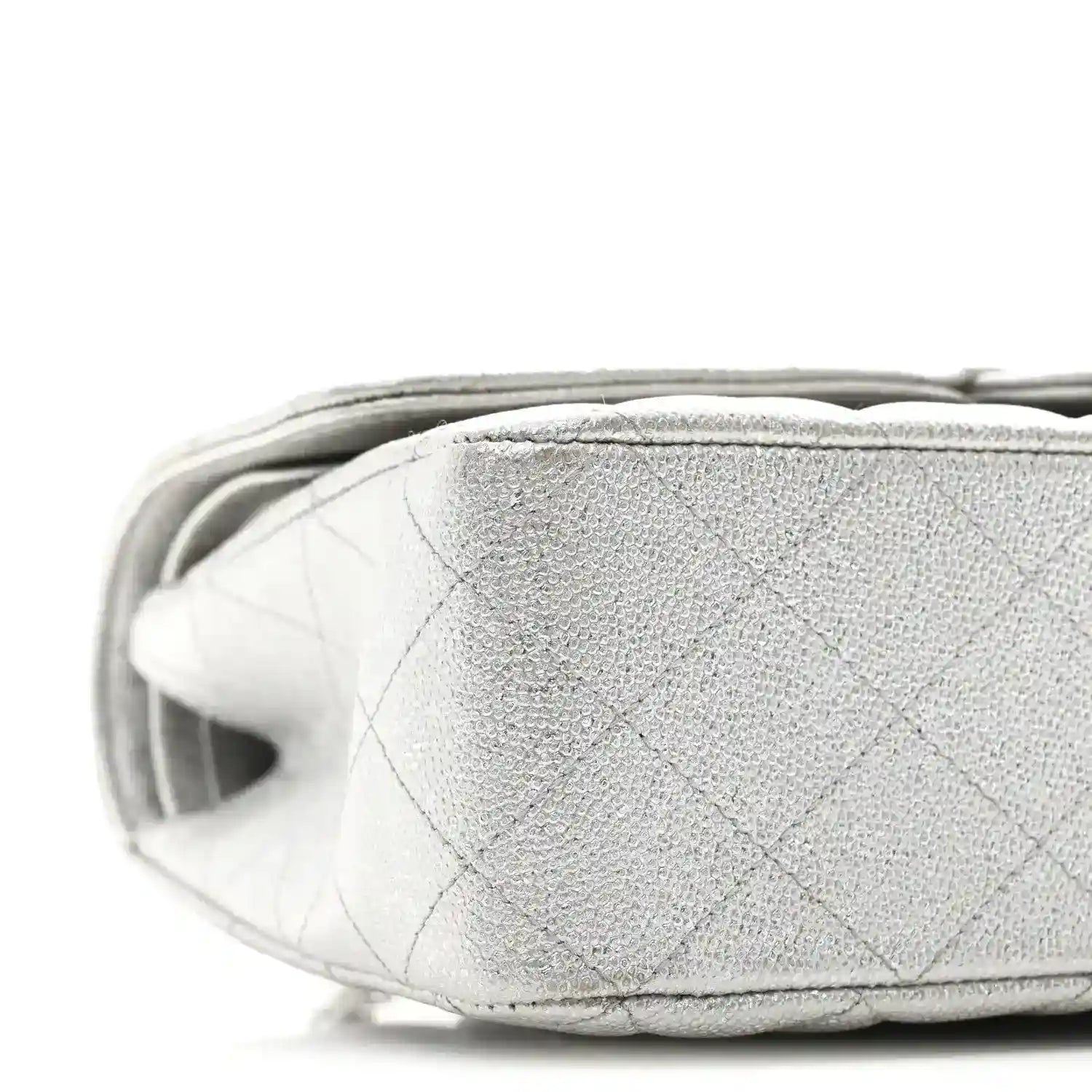 Chanel silver metallic double flap bag side panel close-up with quilted texture