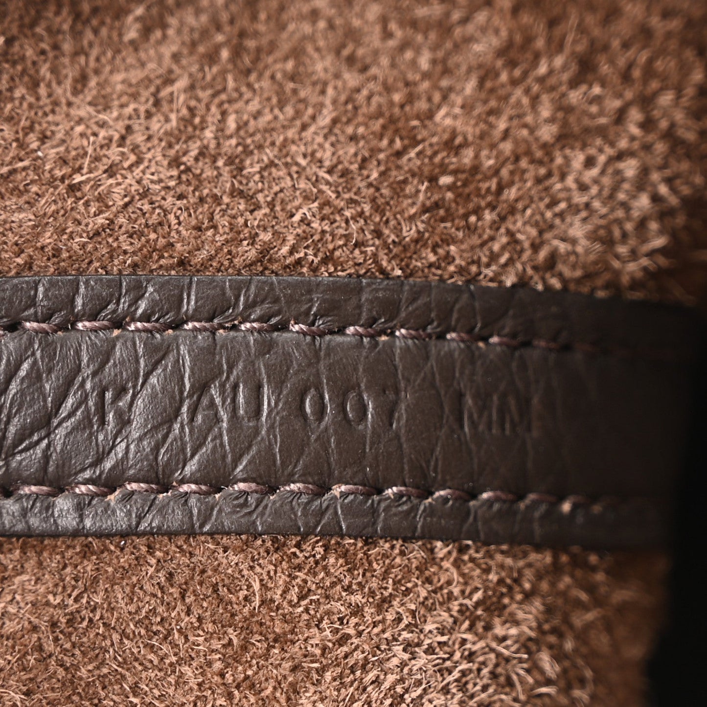 Leather tote edge with contrast stitching detail