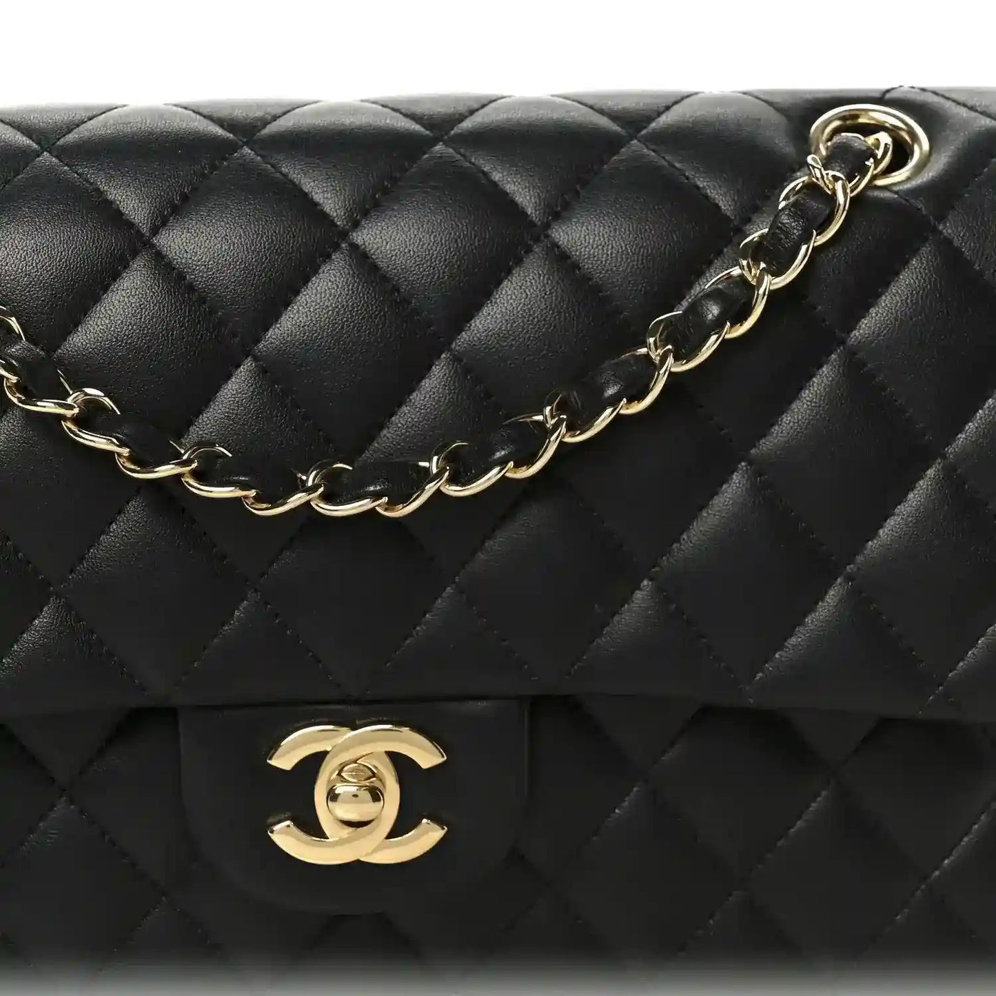 Chanel black quilted flap with gold logo and attached gold chain strap