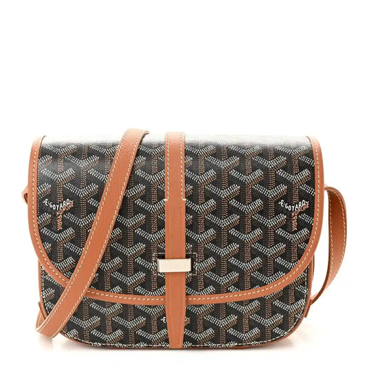 Monogram messenger bag with dark pattern, tan leather trim, front flap and crossbody strap