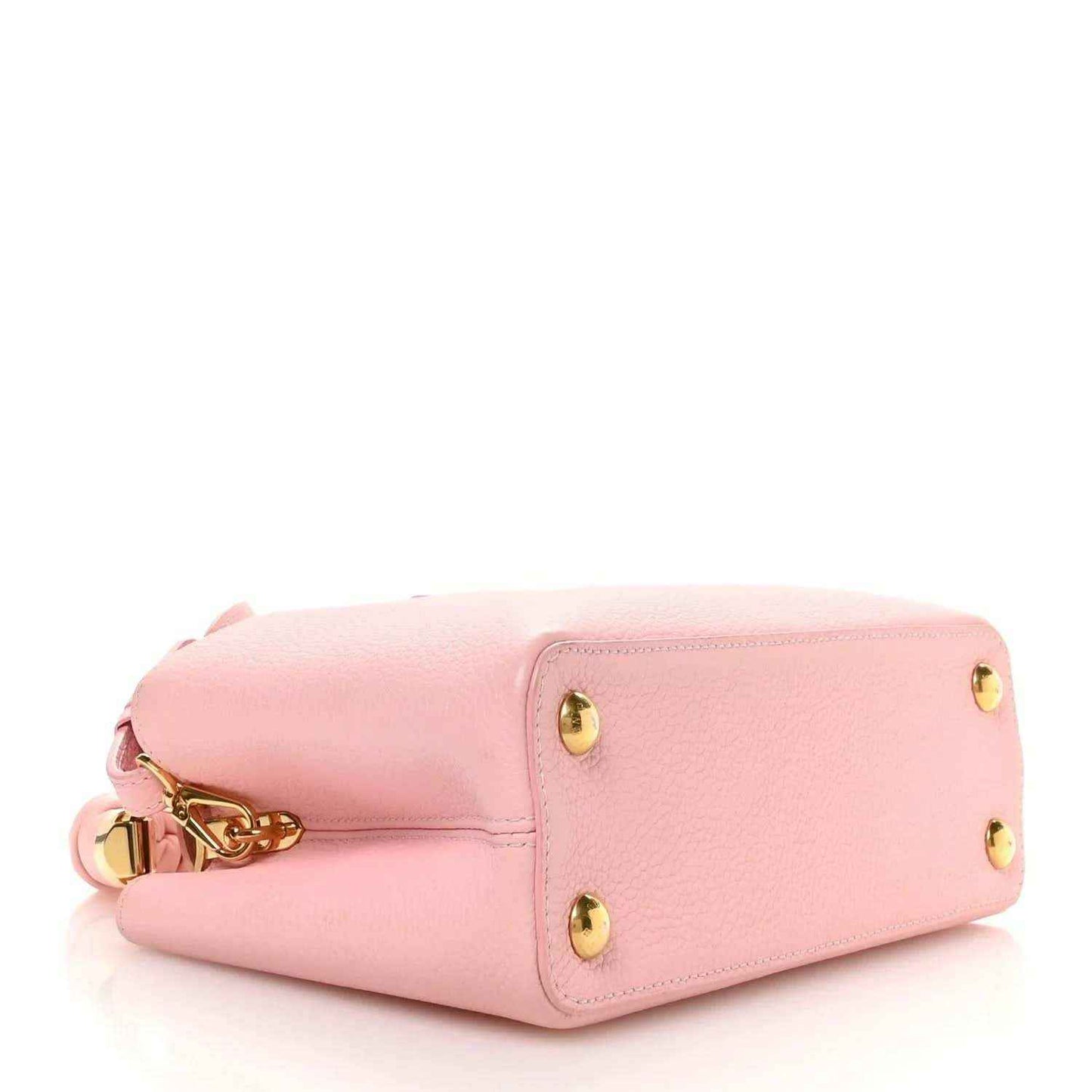 Bubble gum pink leather Capucines BB bag with flap top and gold turn-lock closure