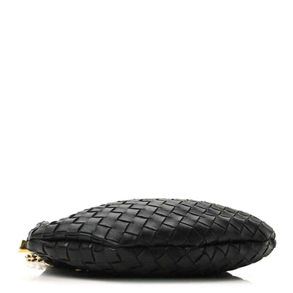 Bottega Veneta intrecciato hobo bag in black with flat base and gold hardware.