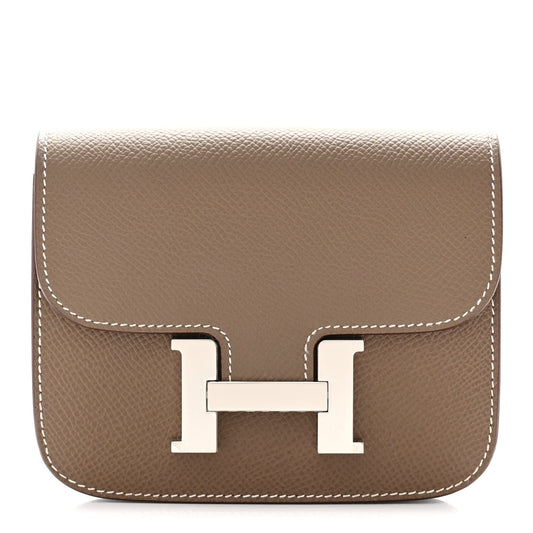 Taupe slim wallet with front H clasp and white contrast stitching