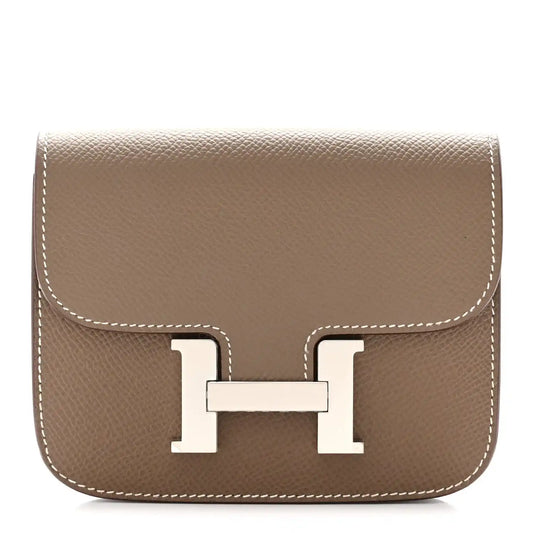 Taupe slim wallet with front H clasp and white contrast stitching