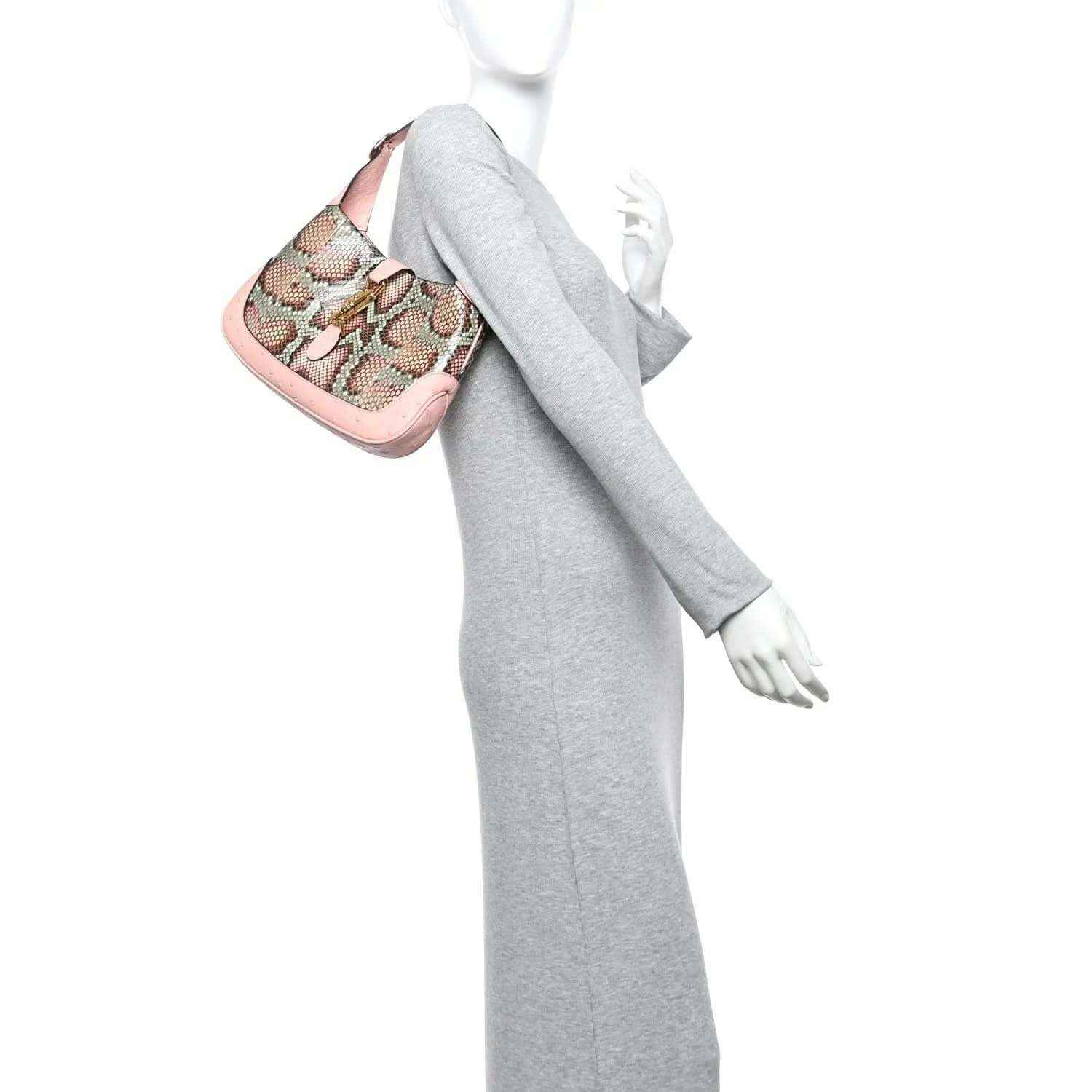 Gucci small hobo bag with snakeskin print, shown on model