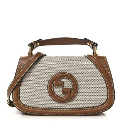 Medium top-handle bag with GG logo patch, beige canvas and brown leather trim