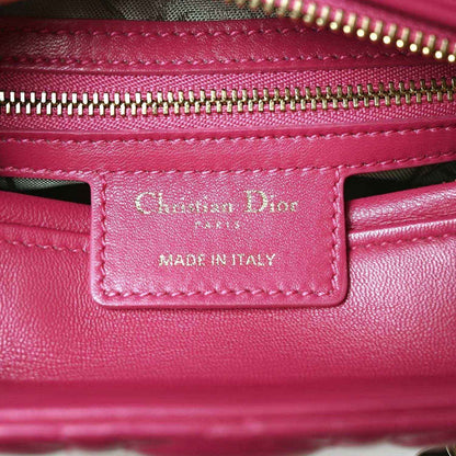 Fuchsia leather interior label: Christian Dior, Made in Italy