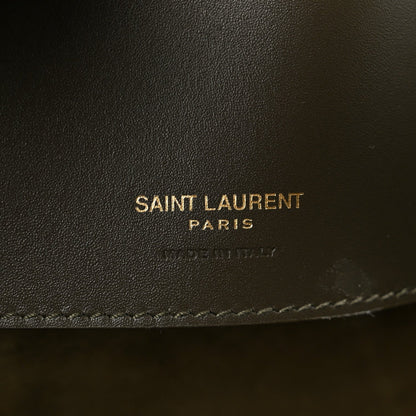 Saint Laurent leather bag imprint and stitched edge on deep musk calfskin.