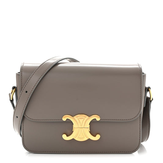 Celine shiny calfskin shoulder bag with gold-tone logo and flap closure, light gray