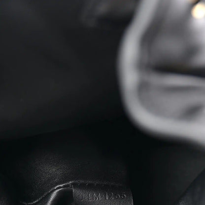 Celine calfskin Bonnie backpack close-up of embossed serial number.