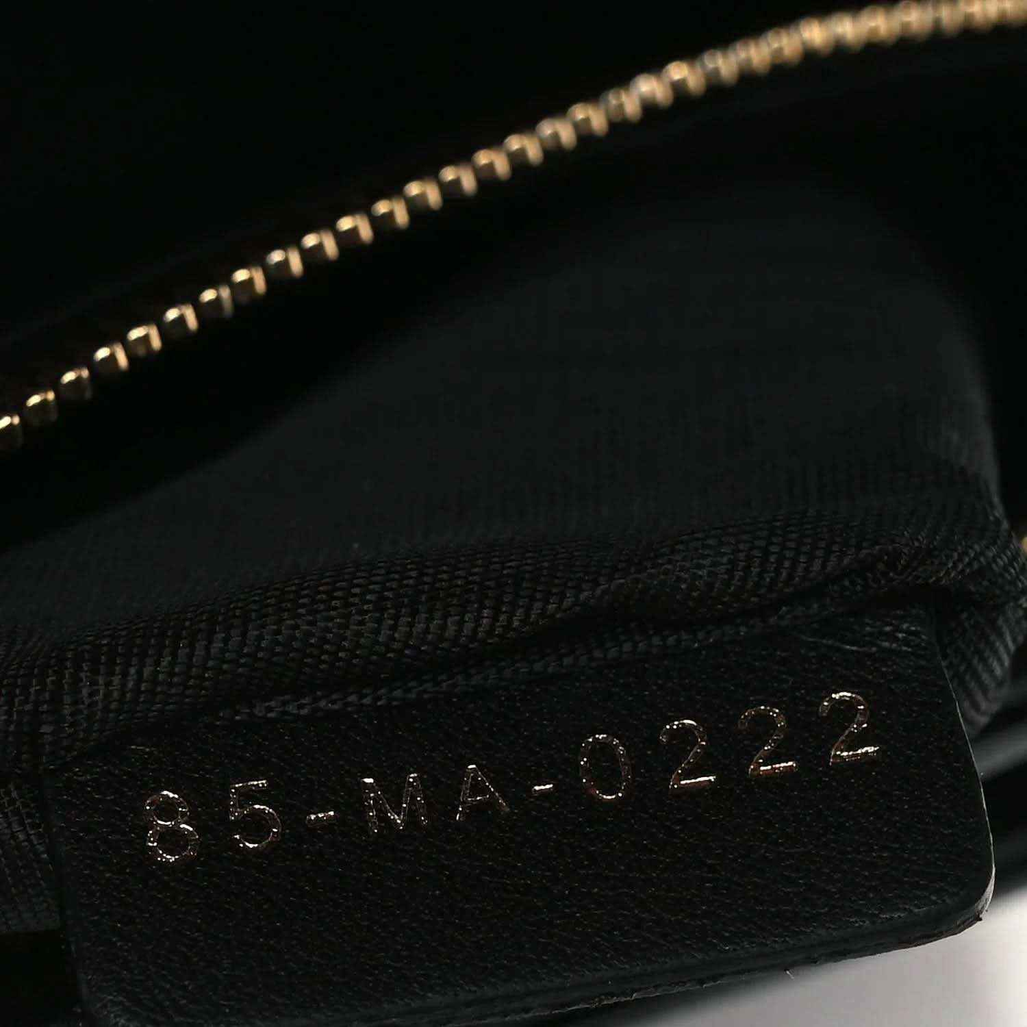 Black patent Lady Dior pouch interior stamp with serial-like code
