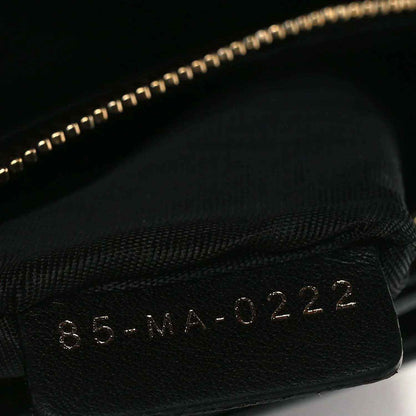 Black patent Lady Dior pouch interior stamp with serial-like code